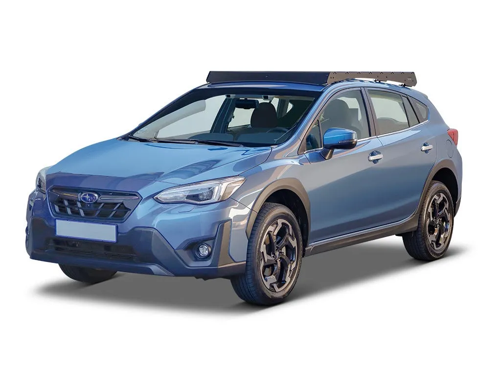 SUV compact bleu équipé d'une galerie Front Runner Slimsport